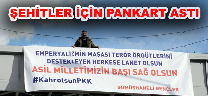 ŞEHİTLER İÇİN PANKART ASTI