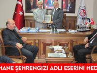GÜMÜŞHANE ŞEHRENGİZİ ADLI ESERİNİ HEDİYE ETTİ